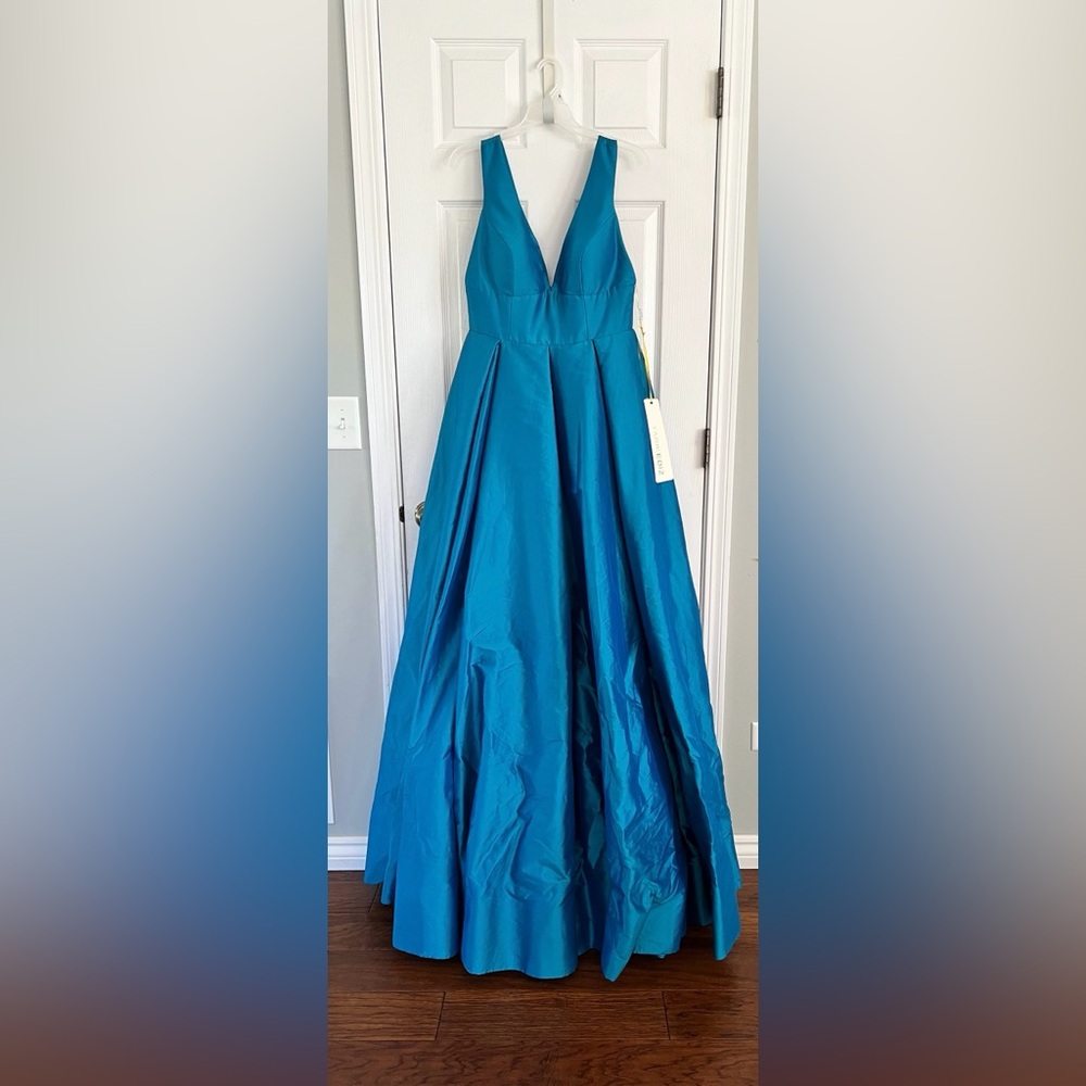 NWT Turquoise, Size 10, Tarik Ediz gown (has pockets!) $130